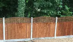 Picket fence installed in a residential yard, adding classic style and curb appeal to homes in {city}, {state}